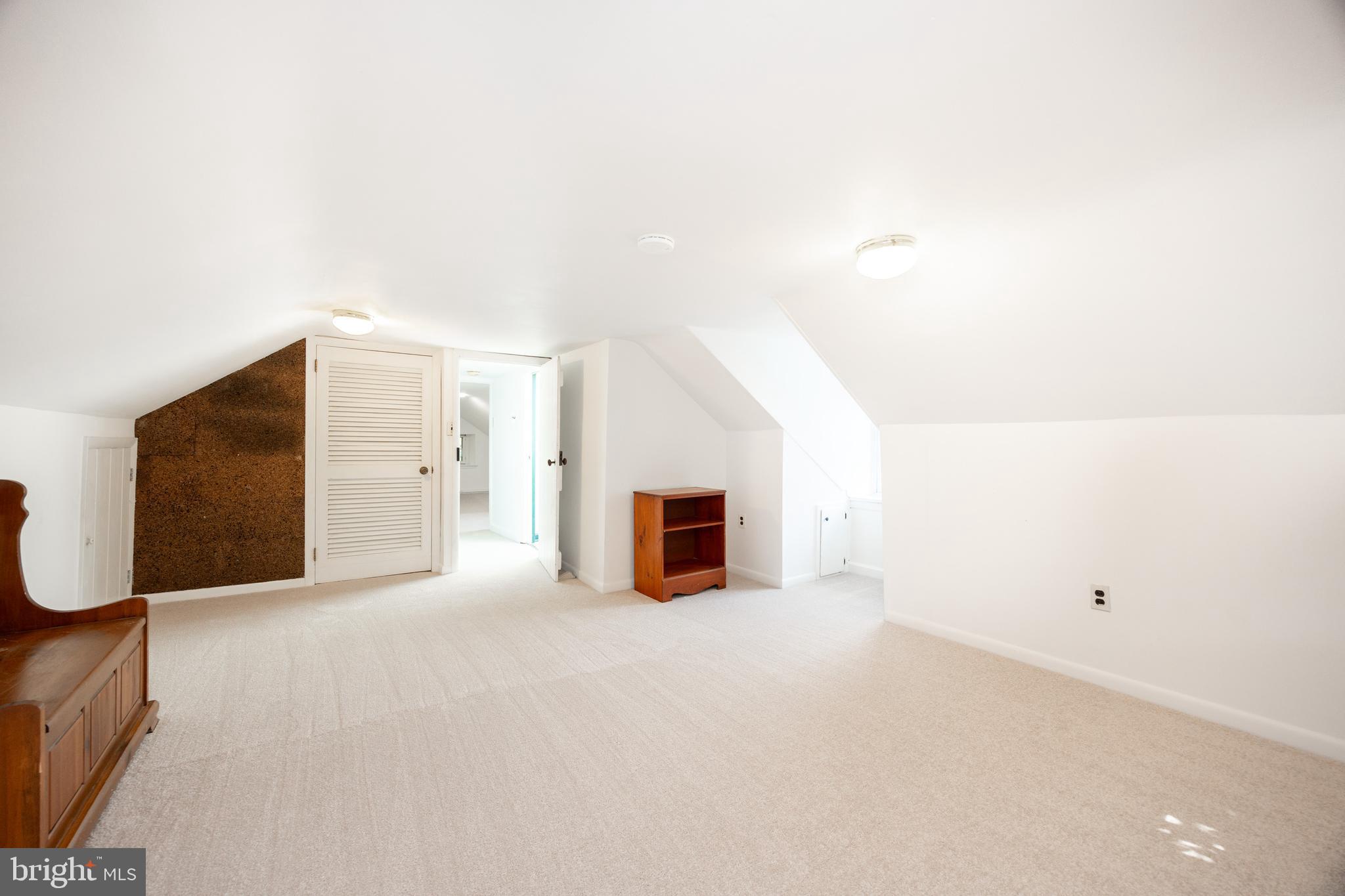 1699 Warpath Road West Chester, PA 19382 - Photo 43 of 65 a view of a livingroom with an empty space and a fireplace