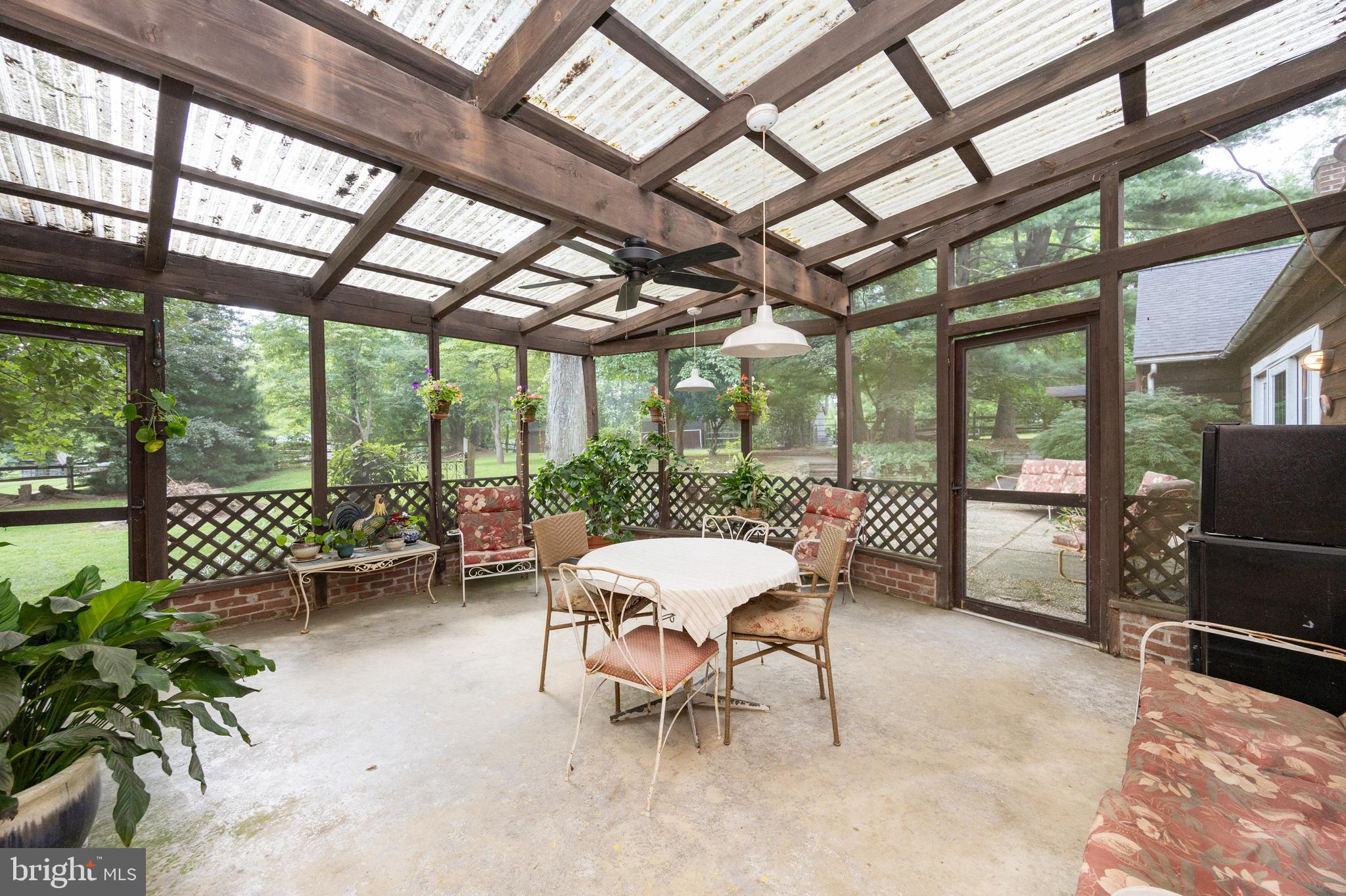 1699 Warpath Road West Chester, PA 19382 - Photo 44 of 65 a outdoor space with lots of furniture and garden view