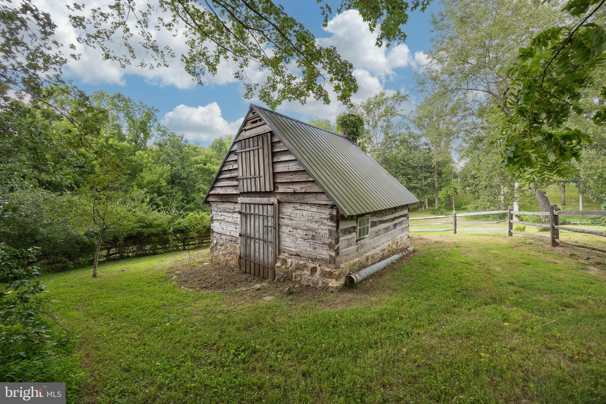 1699 Warpath Road West Chester, PA 19382 - Photo 50 of 65 a view of a house with a yard