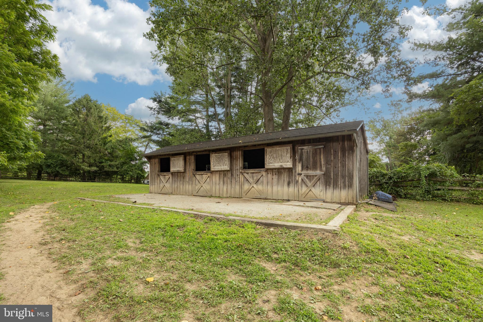 1699 Warpath Road West Chester, PA 19382 - Photo 58 of 65 a front view of a house with a yard