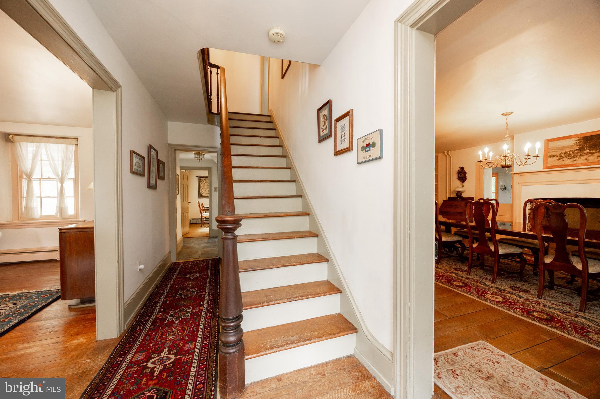 1699 Warpath Road West Chester, PA 19382 - Photo 8 of 65 a view of a livingroom with furniture staircase and windows