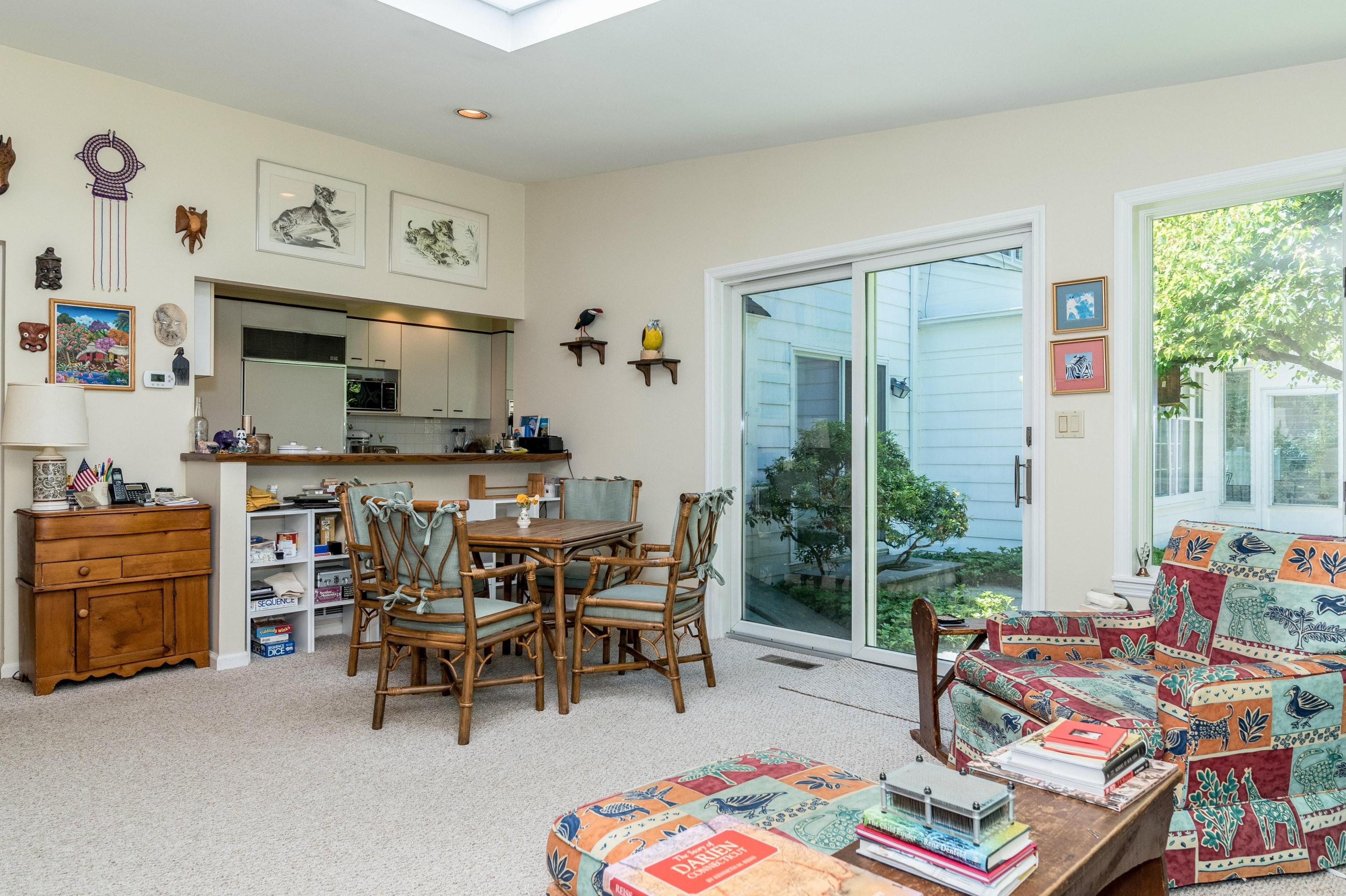 51 St Nicholas Road Darien, CT 06820 - Photo 14 of 34 a living room with furniture and a table