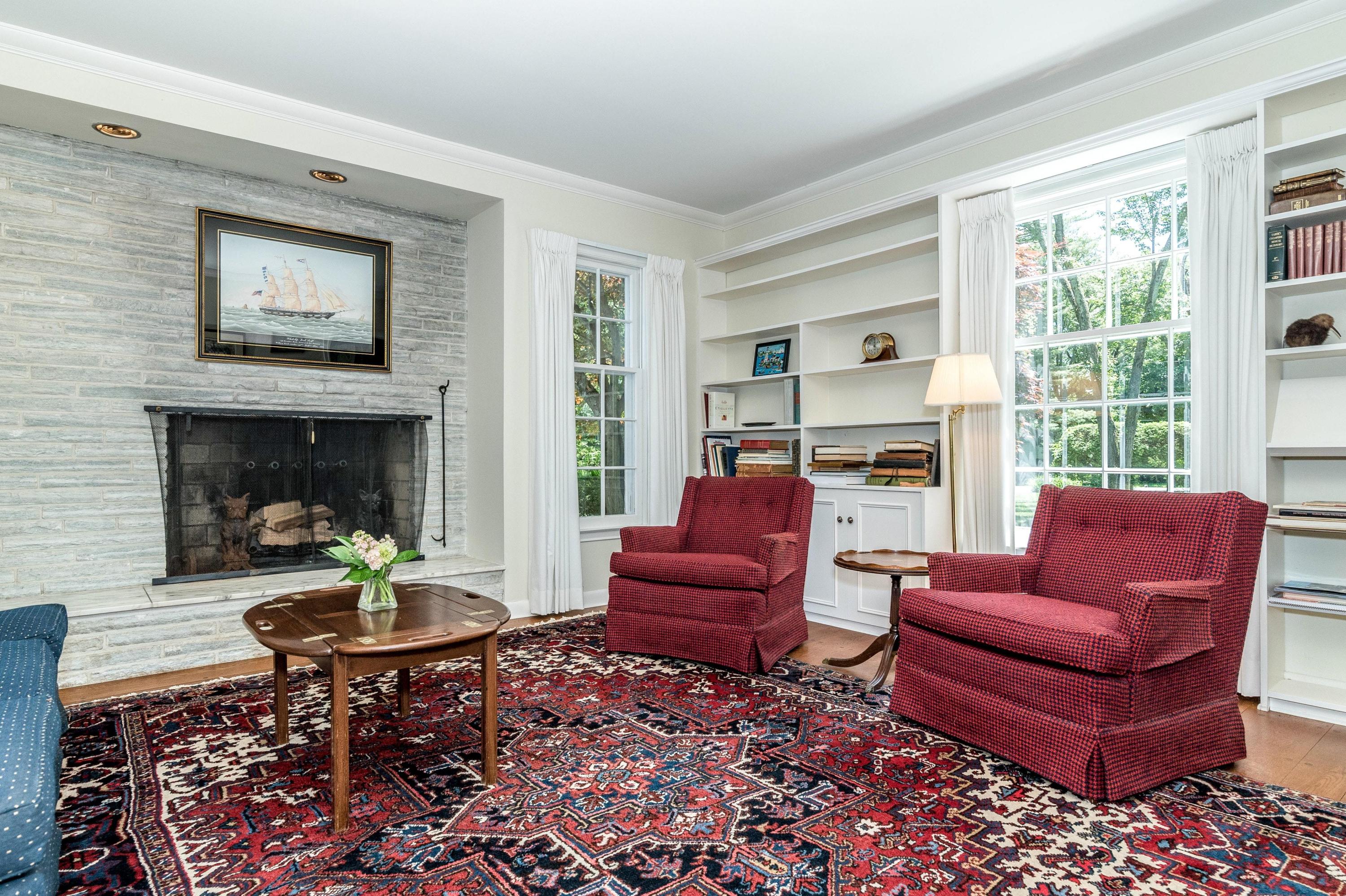 51 St Nicholas Road Darien, CT 06820 - Photo 16 of 34 a living room with furniture fireplace and a window