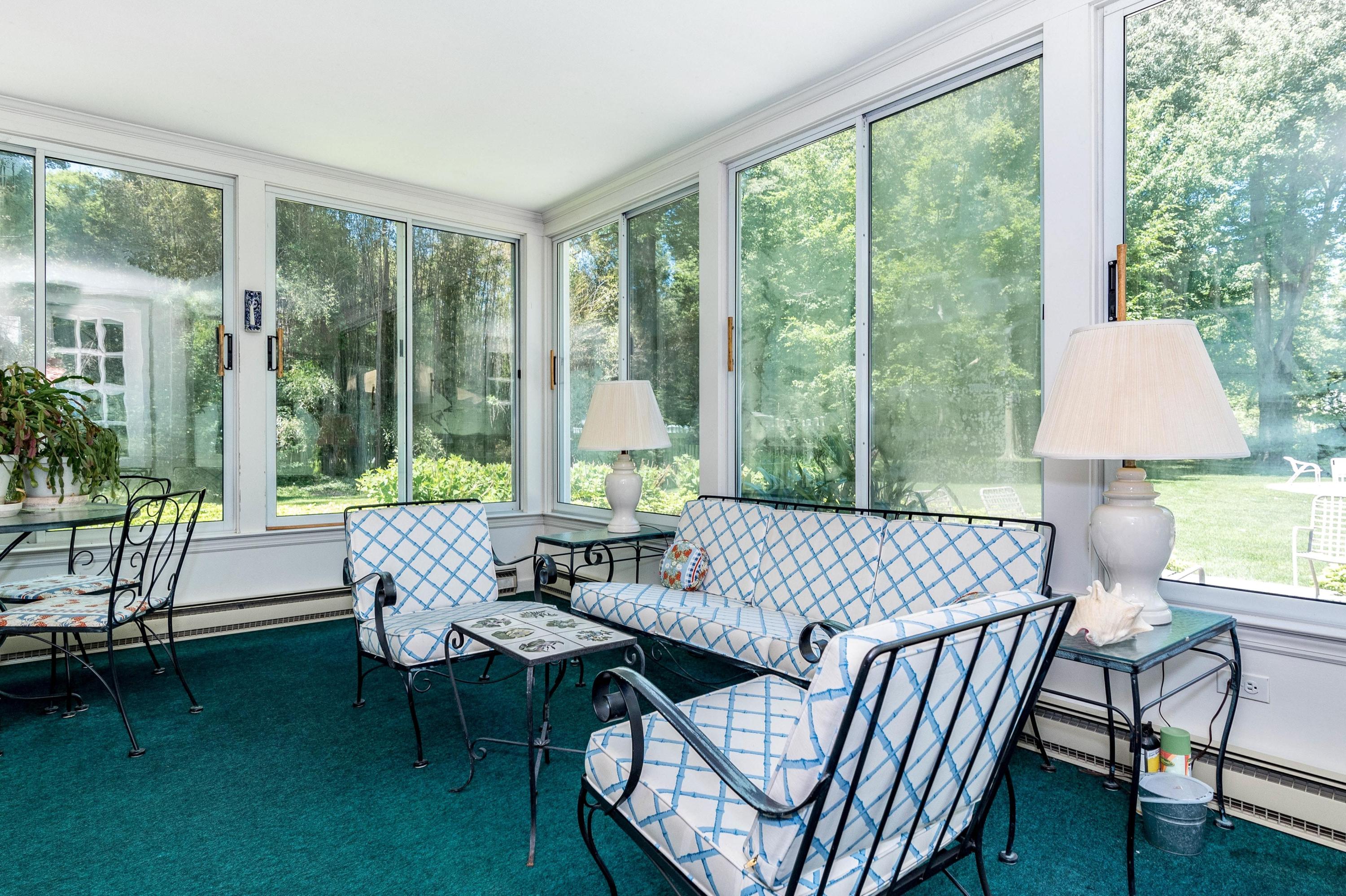 51 St Nicholas Road Darien, CT 06820 - Photo 18 of 34 a view of a dining room with furniture window and outside view