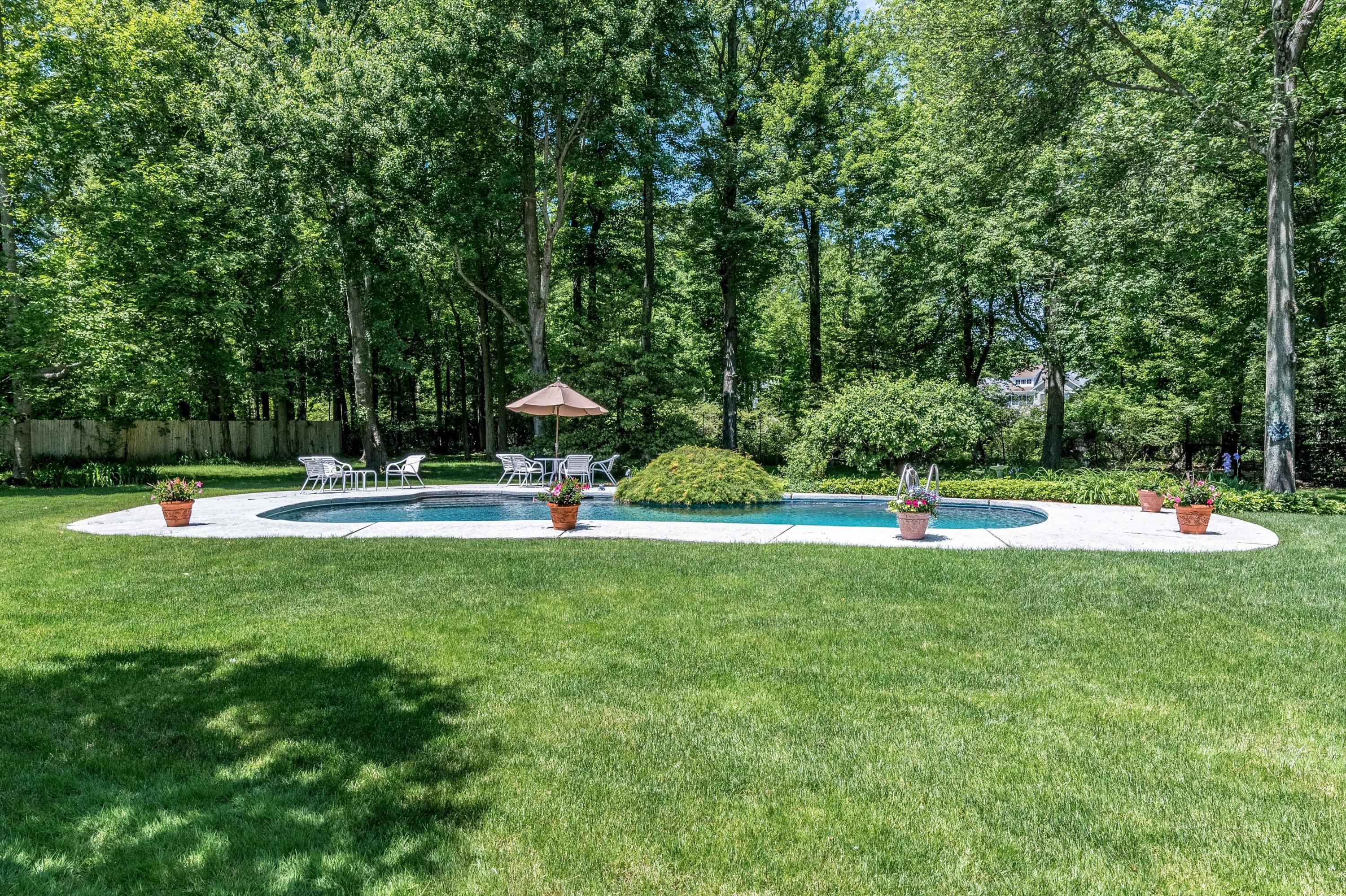 51 St Nicholas Road Darien, CT 06820 - Photo 28 of 34 a view of a park with large trees