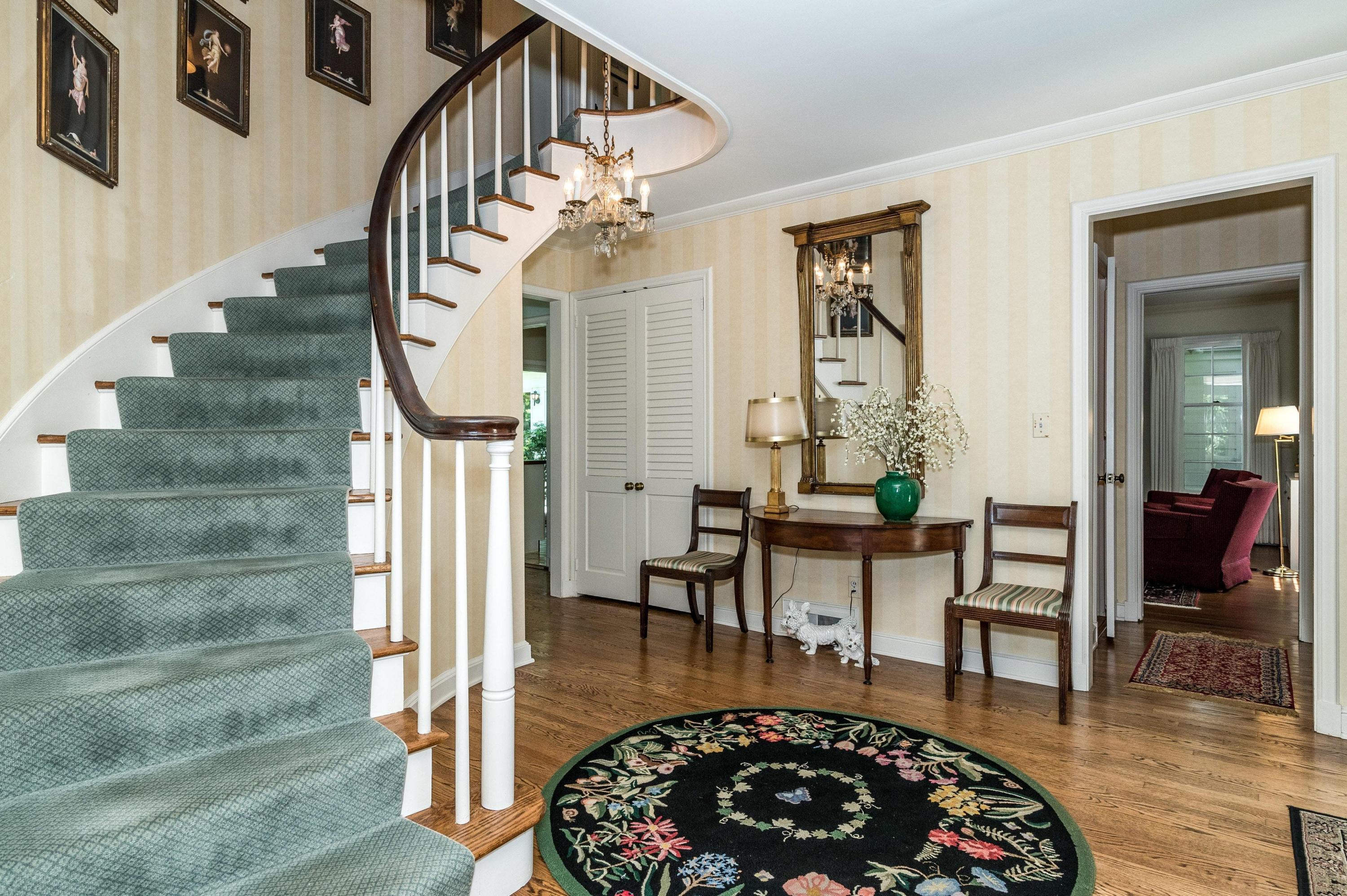 51 St Nicholas Road Darien, CT 06820 - Photo 5 of 34 a view of a livingroom with furniture and wooden floor