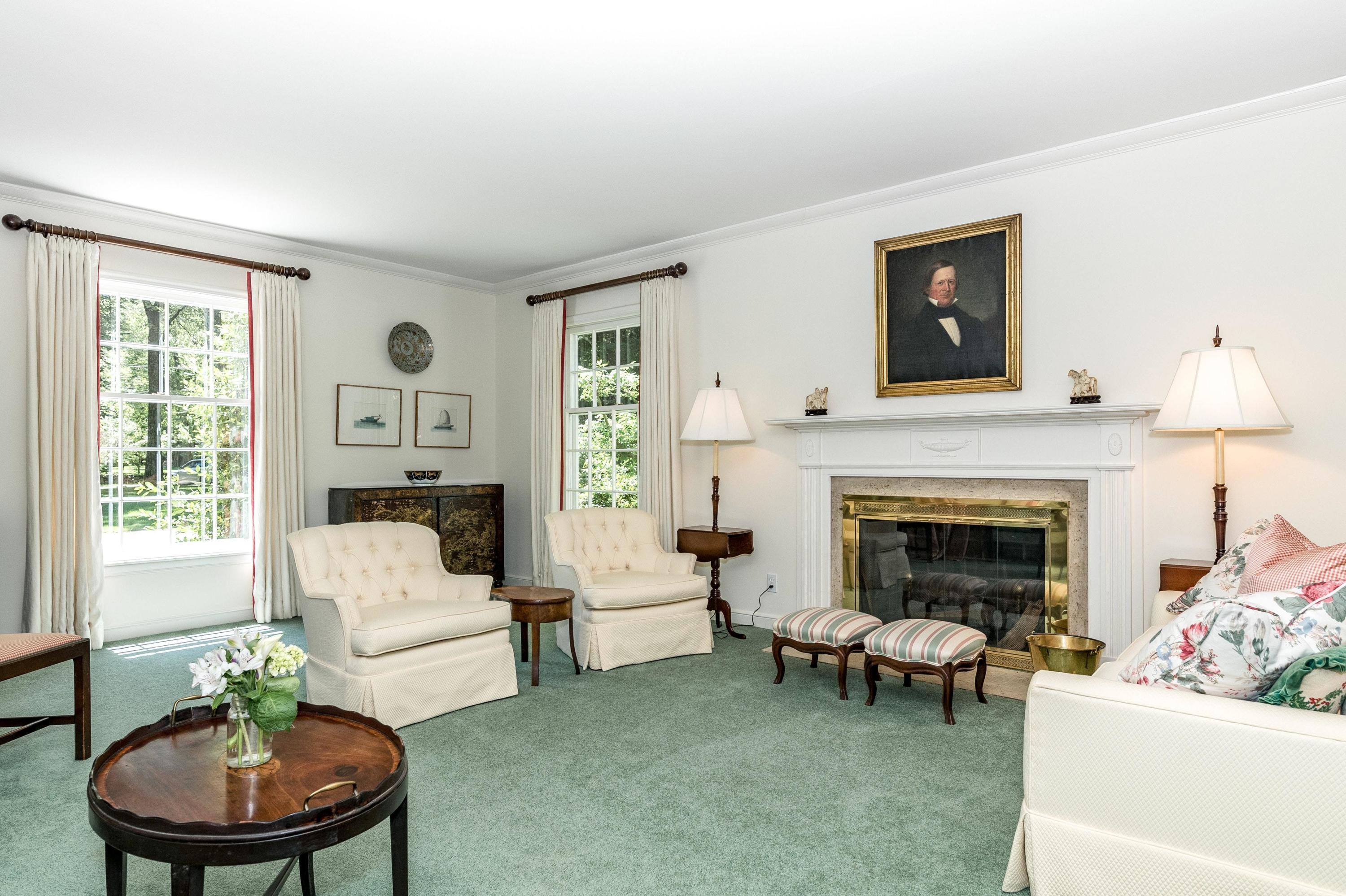 51 St Nicholas Road Darien, CT 06820 - Photo 8 of 34 a living room with furniture and a fireplace
