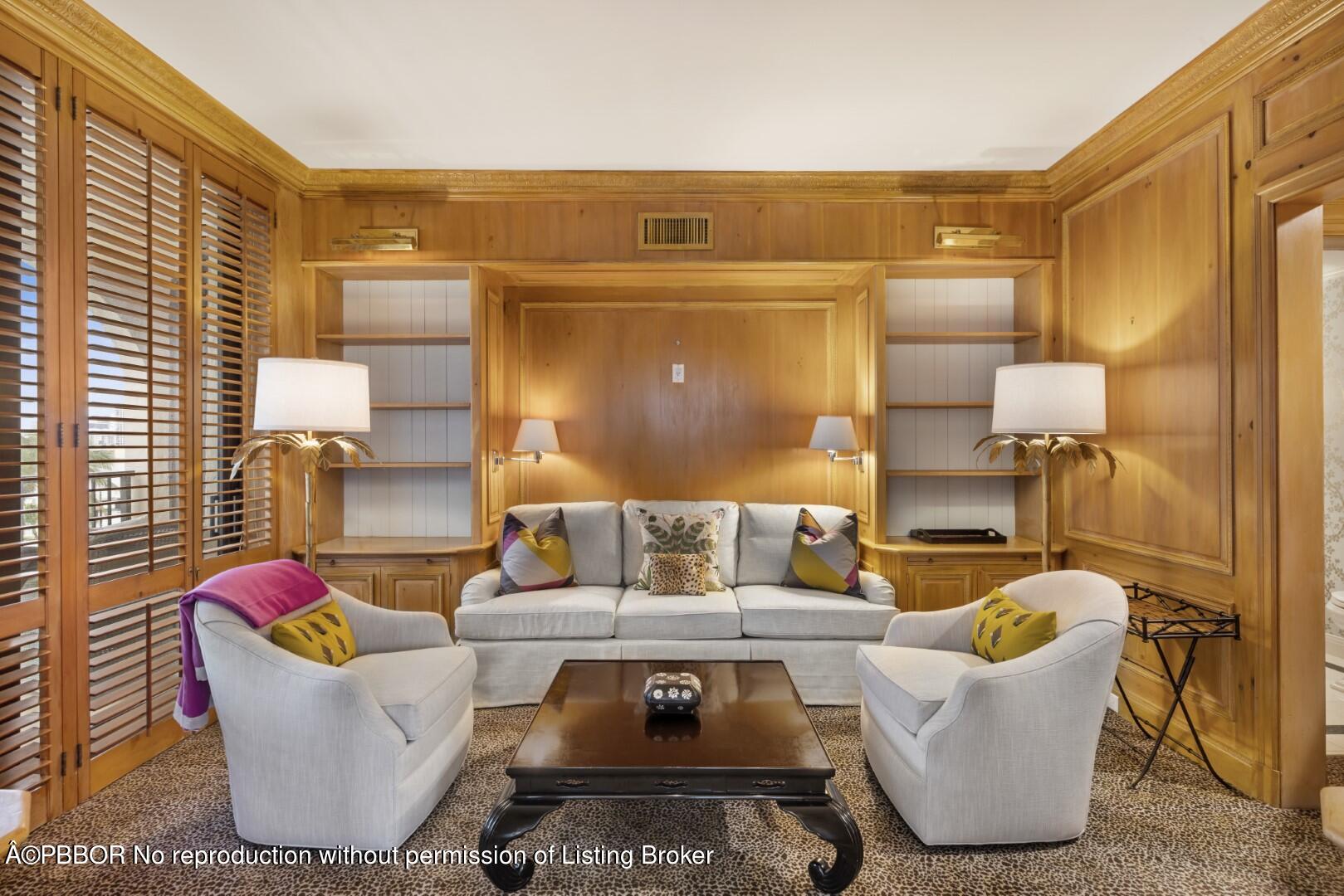 200 Bradley Place, Unit 301 Palm Beach, FL 33480 - Photo 17 of 34 a living room with a couch and a stove