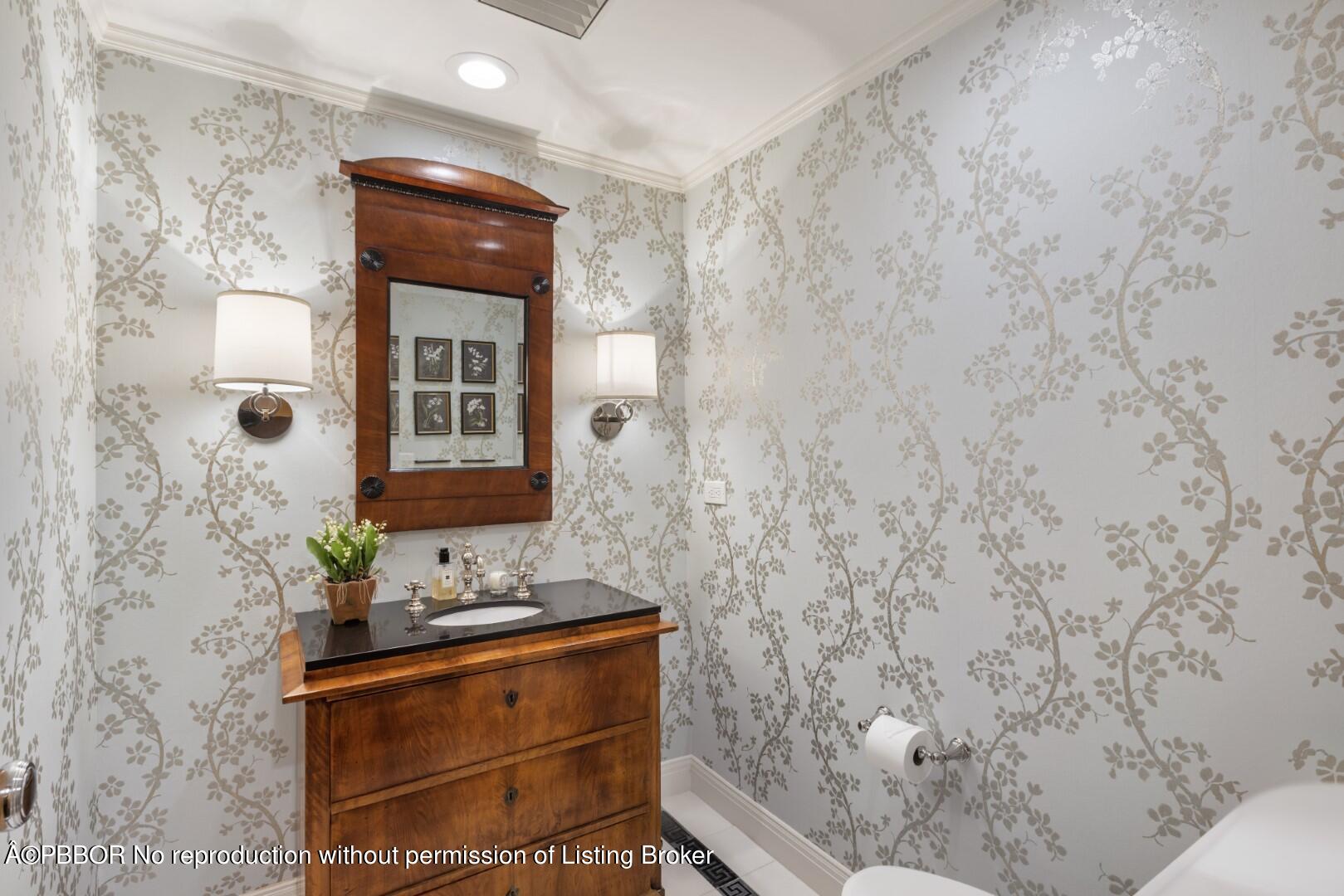 200 Bradley Place, Unit 301 Palm Beach, FL 33480 - Photo 23 of 34 a bathroom with a granite countertop sink and a mirror