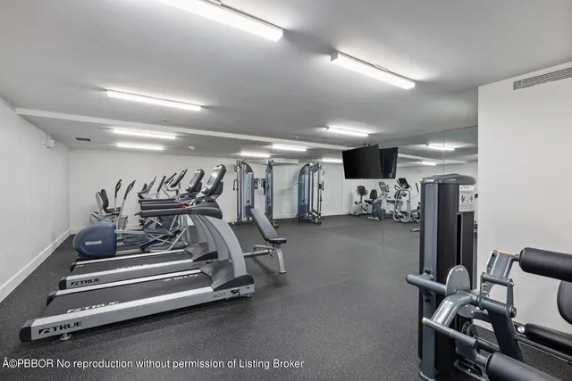 a view of a room with gym equipment
