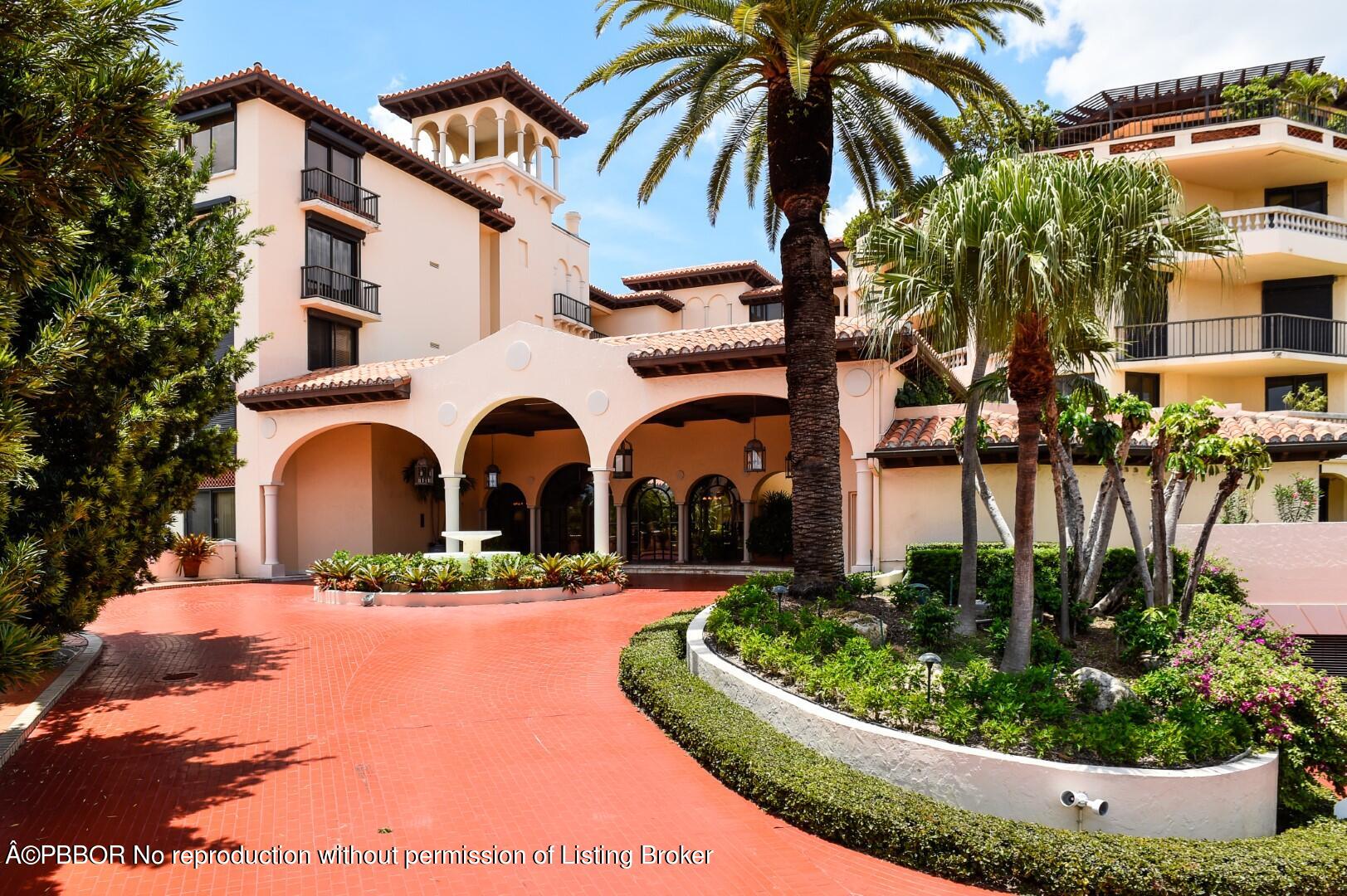 200 Bradley Place, Unit 301 Palm Beach, FL 33480 - Photo 3 of 34 a front view of a house with a yard