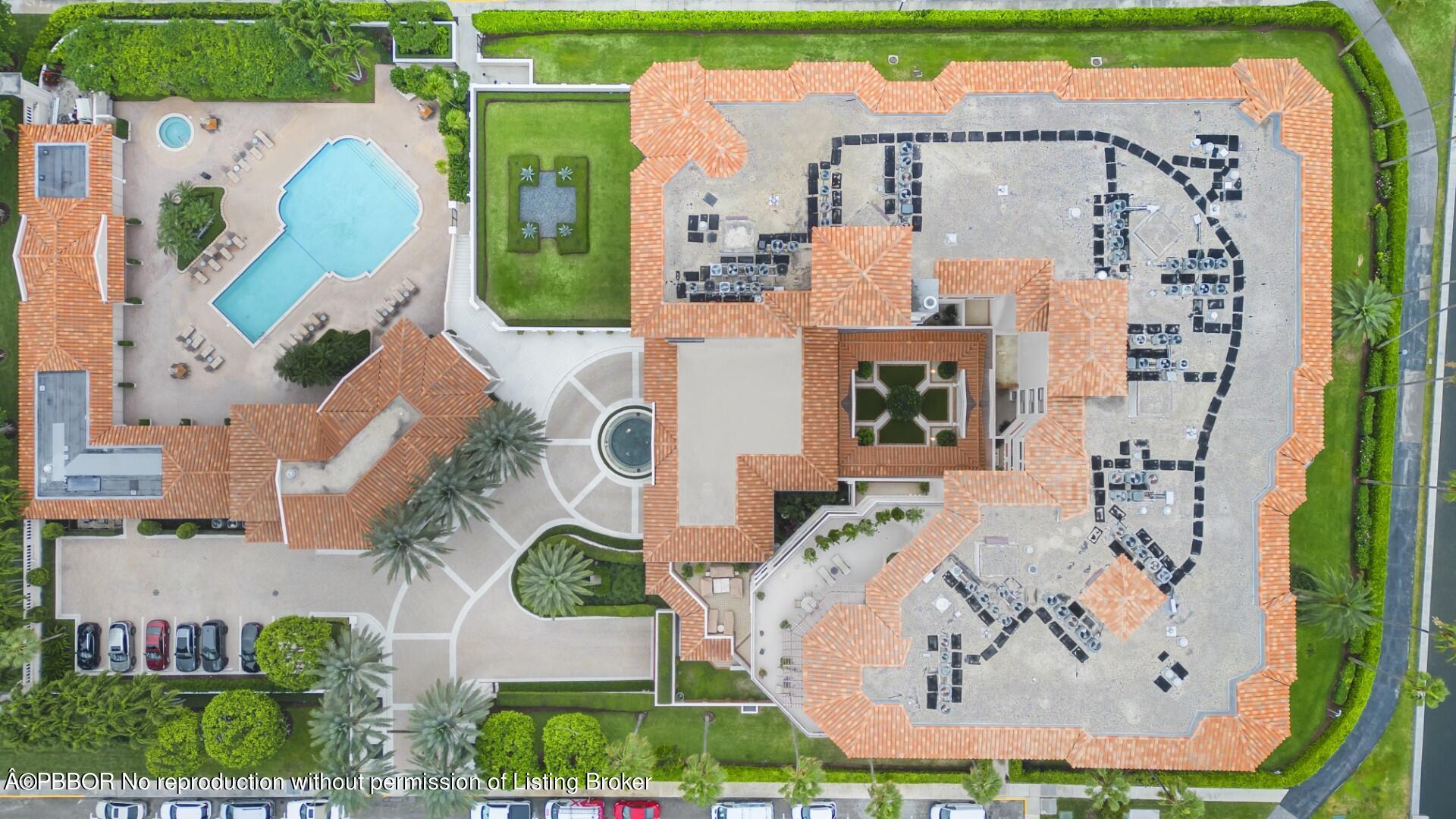 200 Bradley Place, Unit 301 Palm Beach, FL 33480 - Photo 33 of 34 an aerial view of a house with a swimming pool outdoor seating and yard