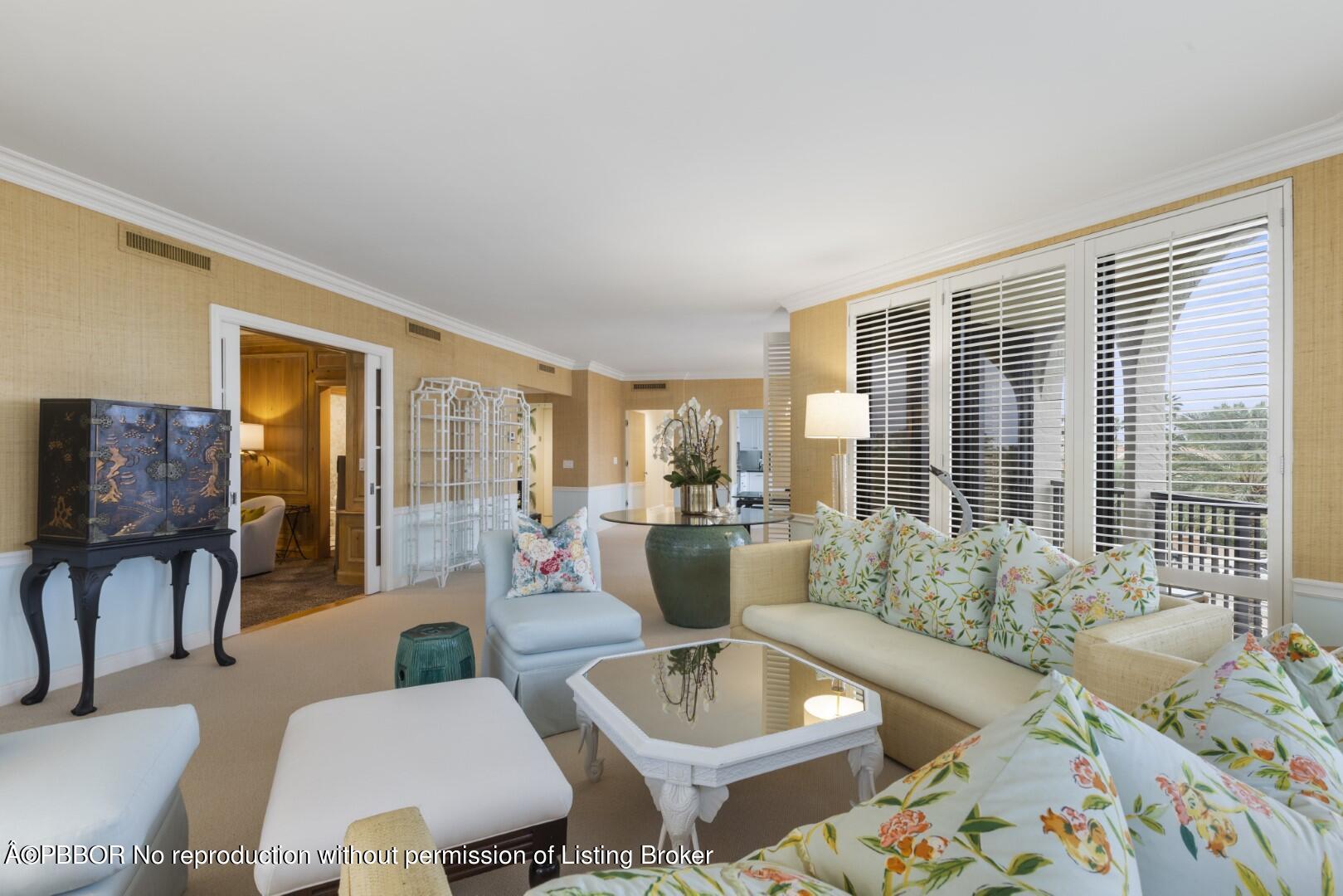 200 Bradley Place, Unit 301 Palm Beach, FL 33480 - Photo 6 of 34 a living room with furniture and a large window