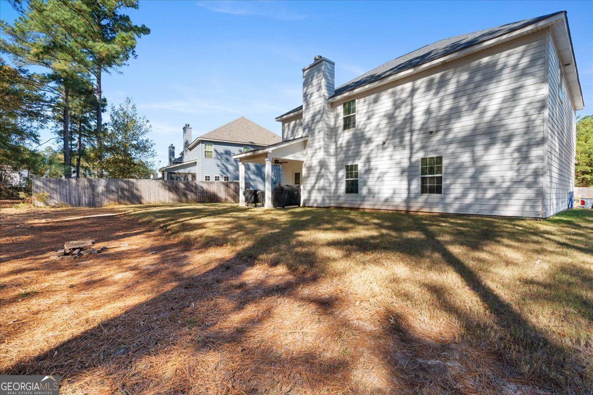 108 East River Cane Run Perry, GA 31069 - Photo 38 of 38 a view of a building with a street