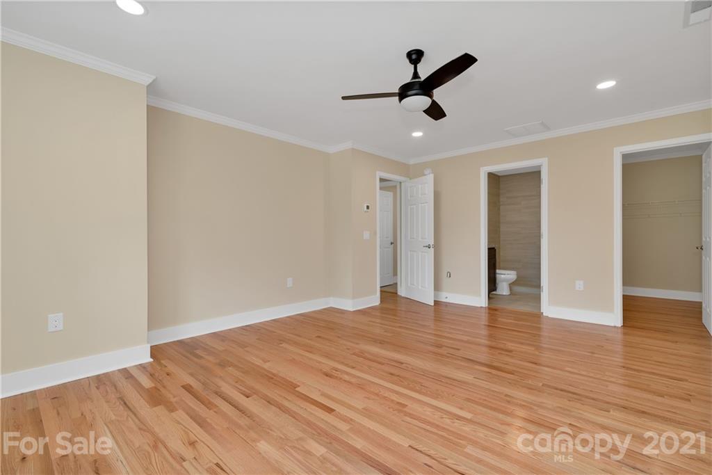 275 Ridge View Drive, Unit 1 Clyde, NC 28721 - Photo 17 of 22 a view of empty room with wooden floor