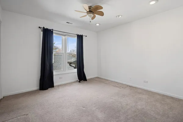 a balcony with wooden floor