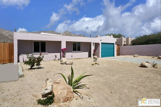 a view of a house with a patio