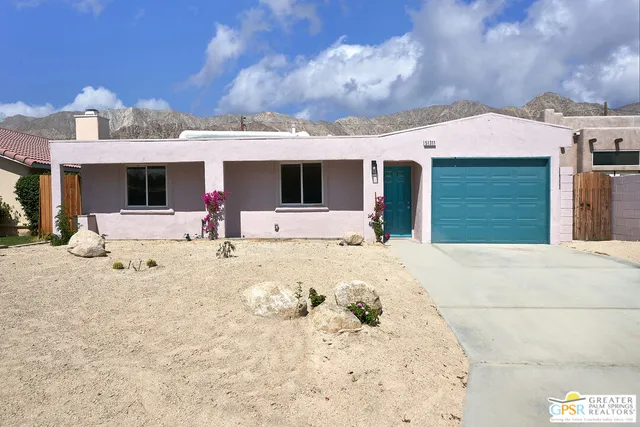 a view of a house with a patio