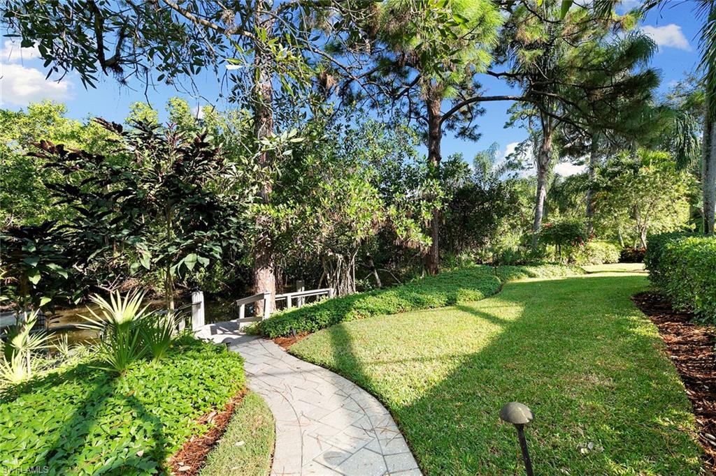 927 Barcarmil Way Naples, FL 34110 - Photo 48 of 50 View of grassy yard