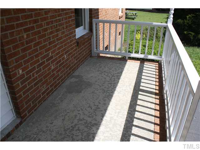2753 Micro Road West Selma, NC 27576 - Photo 7 of 16 COVERED CONCRETE FRONT PORCH *BRING THE ROCKING CHAIRS