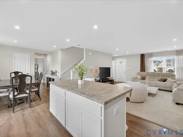 a view of a living room and dining room