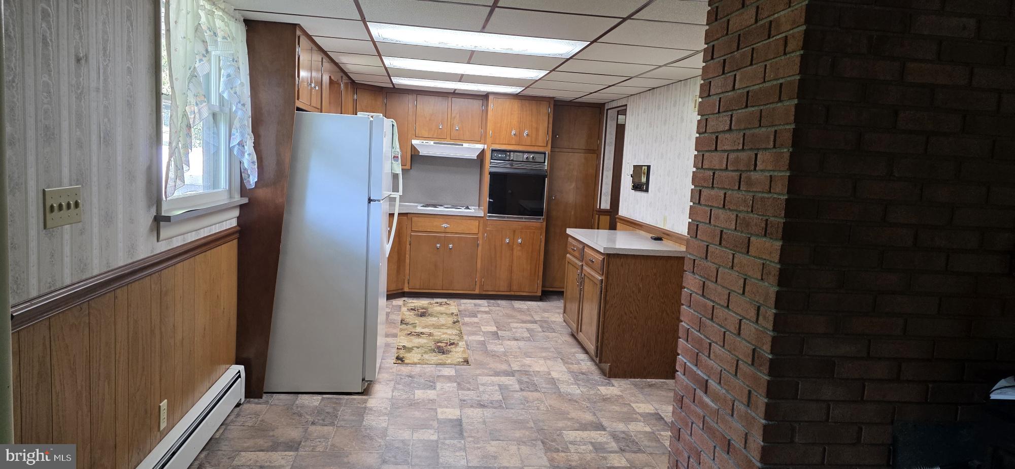 4819 Five Point Road New Tripoli, PA 18066 - Photo 34 of 52 a view of a kitchen with refrigerator and microwave