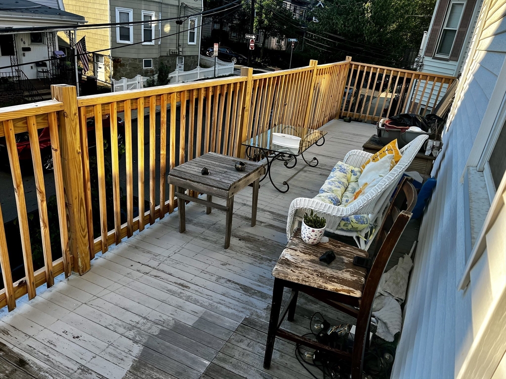 63 Sycamore Street, Unit 2 Somerville, MA 02145 - Photo 8 of 9 a view of outdoor space with seating