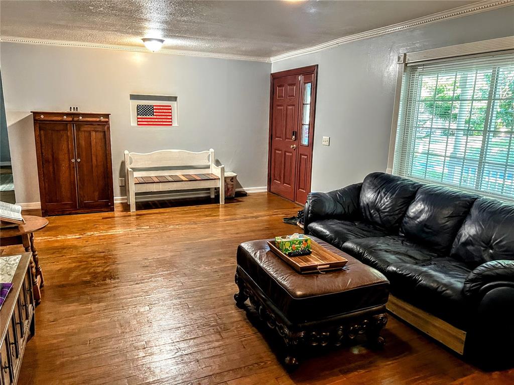 4515 Orangewood Loop East Lakeland, FL 33813 - Photo 11 of 39 a living room with furniture and a window