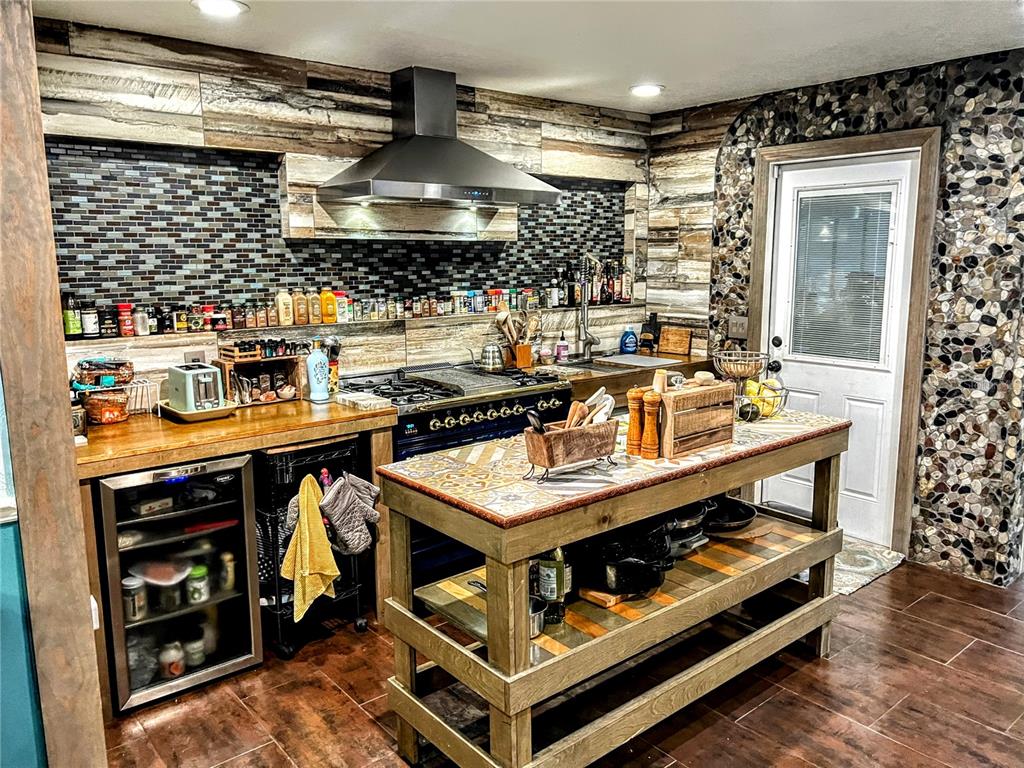 4515 Orangewood Loop East Lakeland, FL 33813 - Photo 23 of 39 a kitchen with stainless steel appliances granite countertop a stove and a sink