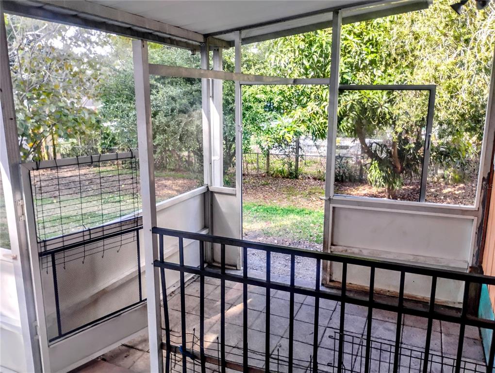 4515 Orangewood Loop East Lakeland, FL 33813 - Photo 28 of 39 a view of a wooden deck