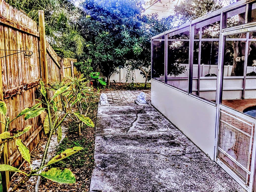 4515 Orangewood Loop East Lakeland, FL 33813 - Photo 35 of 39 a view of a pathway with a garden