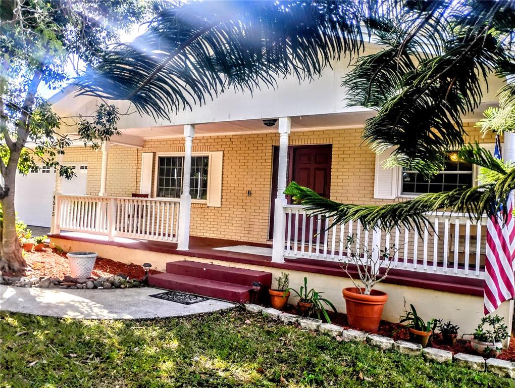 4515 Orangewood Loop East Lakeland, FL 33813 - Photo 5 of 39 front view of a house with a patio