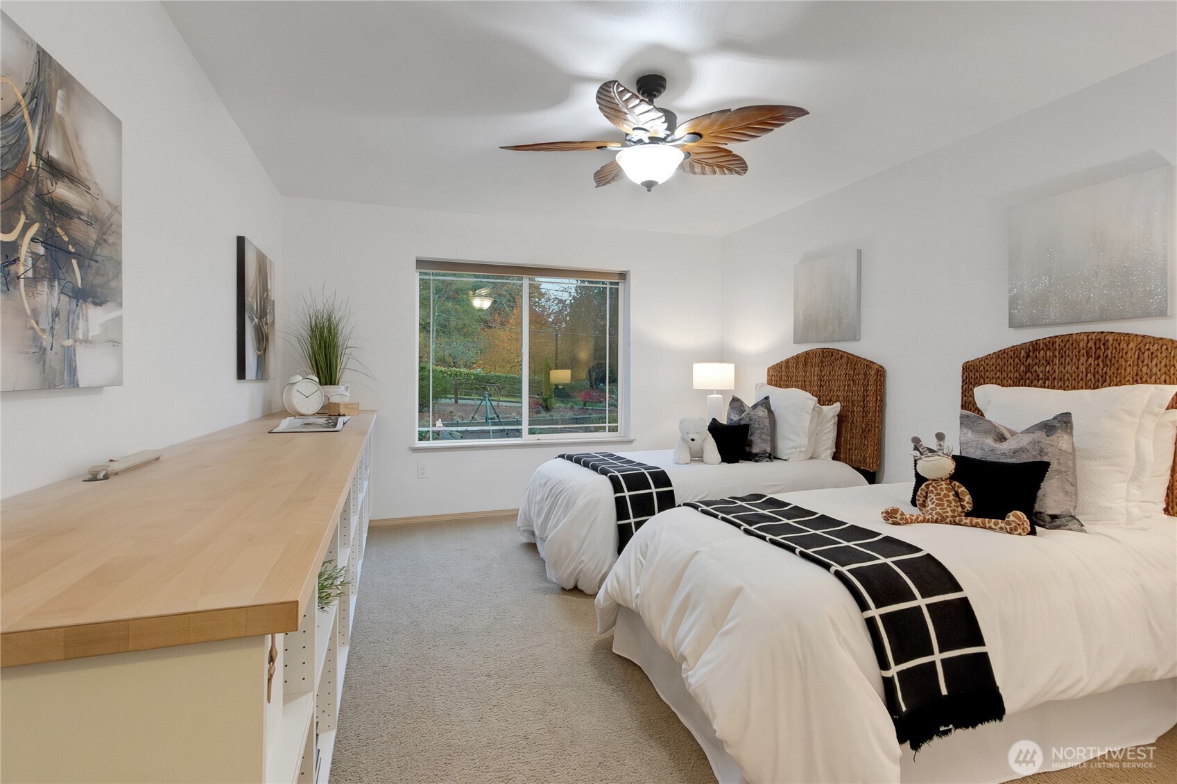 1450 Southeast Spruce Road Port Orchard, WA 98367 - Photo 26 of 39 a bedroom with two beds and a chandelier