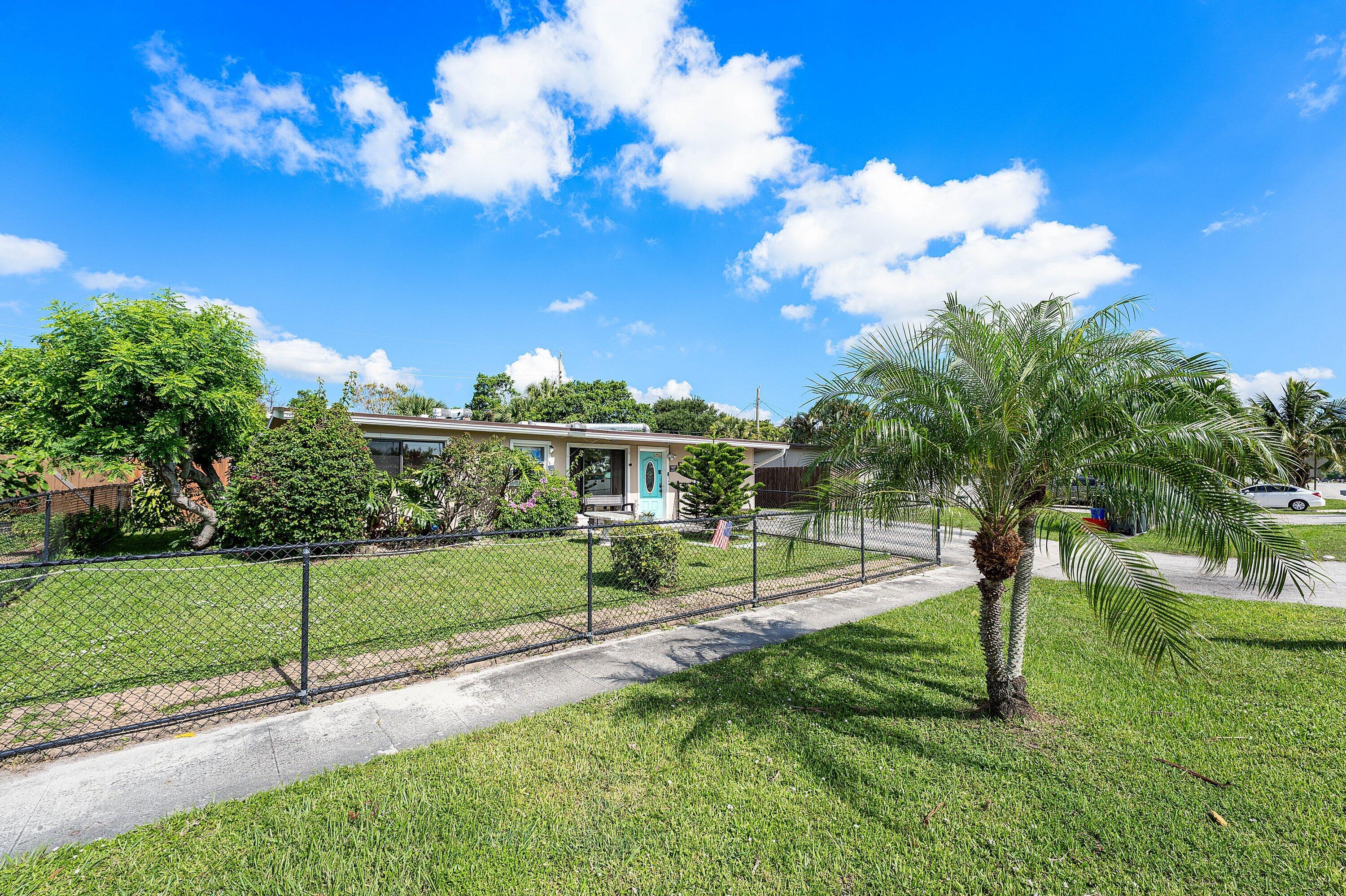 1845 Kudza Road West Palm Beach, FL 33415 - Photo 2 of 10 002-1845KudzaRoad-WestPalmBeach-FL-33415