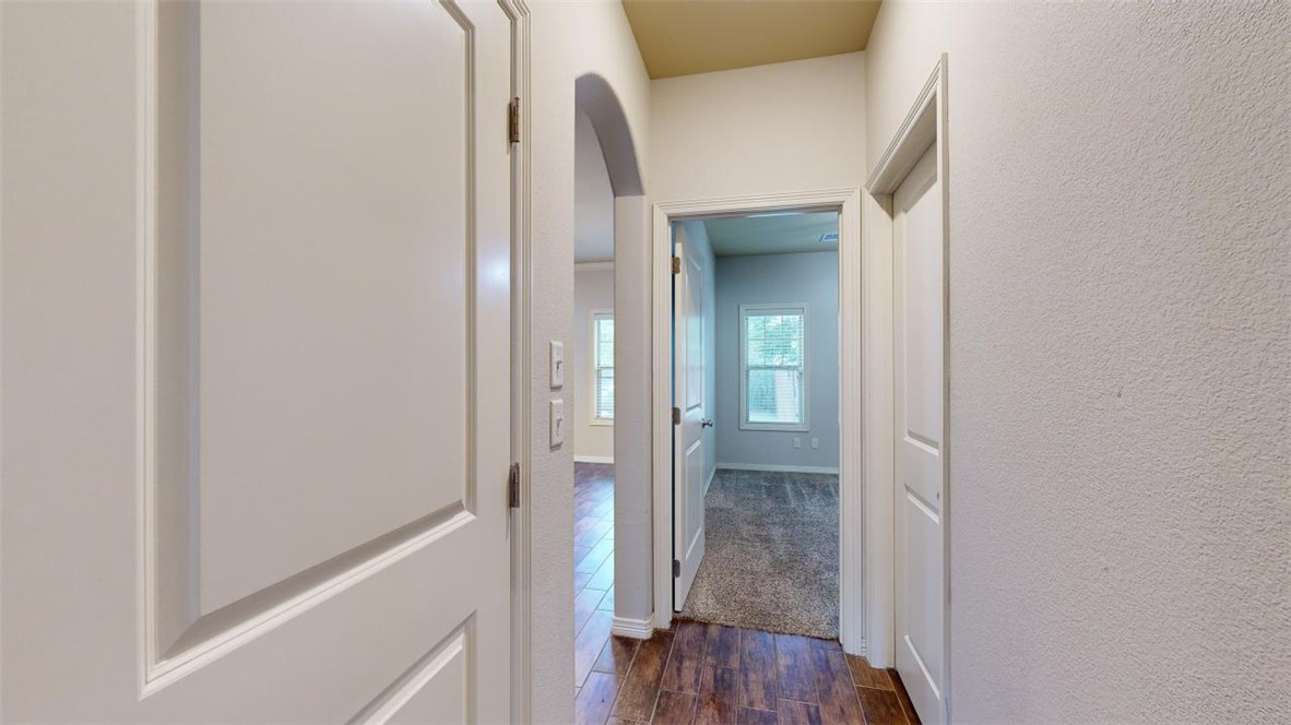 102 Richards Street College Station, TX 77840 - Photo 12 of 41 a view of a hallway with wooden floor