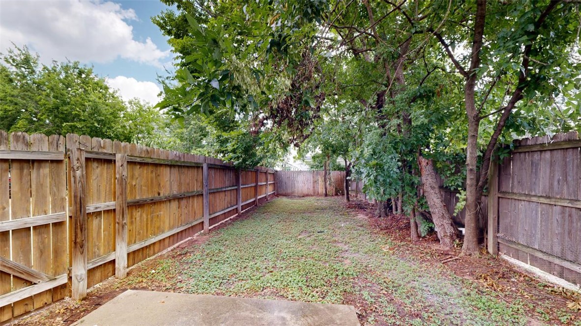 102 Richards Street College Station, TX 77840 - Photo 36 of 41 a backyard of a house with lots of green space
