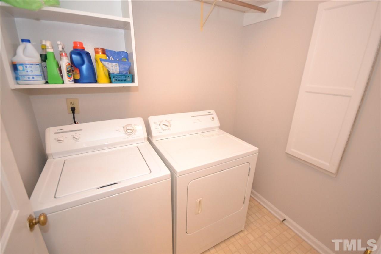 24 Renwick Court Raleigh, NC 27615 - Photo 12 of 20 a utility room with dryer and washer