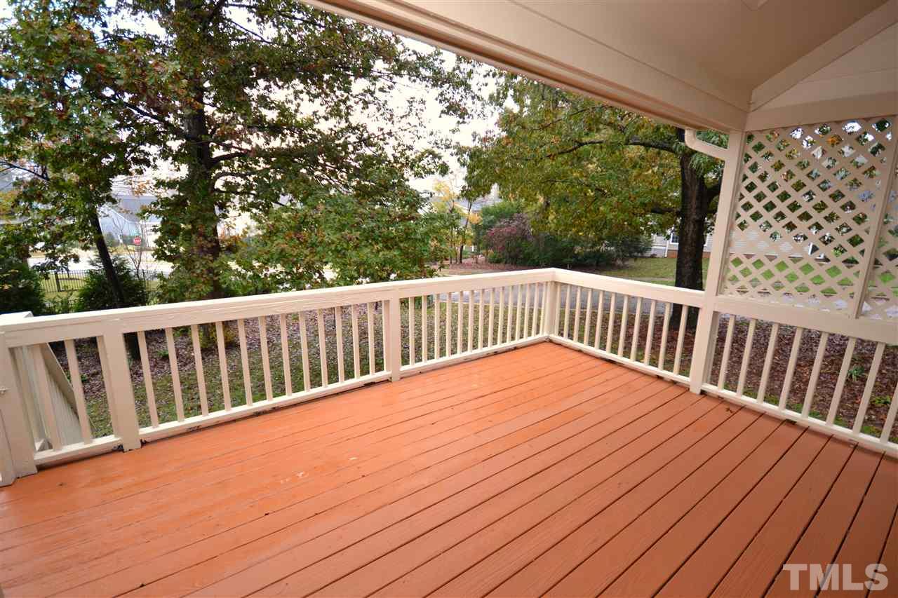 24 Renwick Court Raleigh, NC 27615 - Photo 18 of 20 a view of balcony with wooden floor