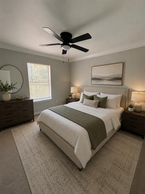 9801 Southeast Sunset Harbor Road Summerfield, FL 34491 - Photo 16 of 37 a bedroom with a bed and window