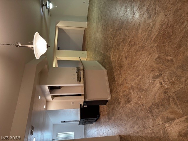 3744 River Heights Lane Logandale, NV 89021 - Photo 16 of 17 An open floorplan with tiled floors creates a seamless flow throughout this inviting space.