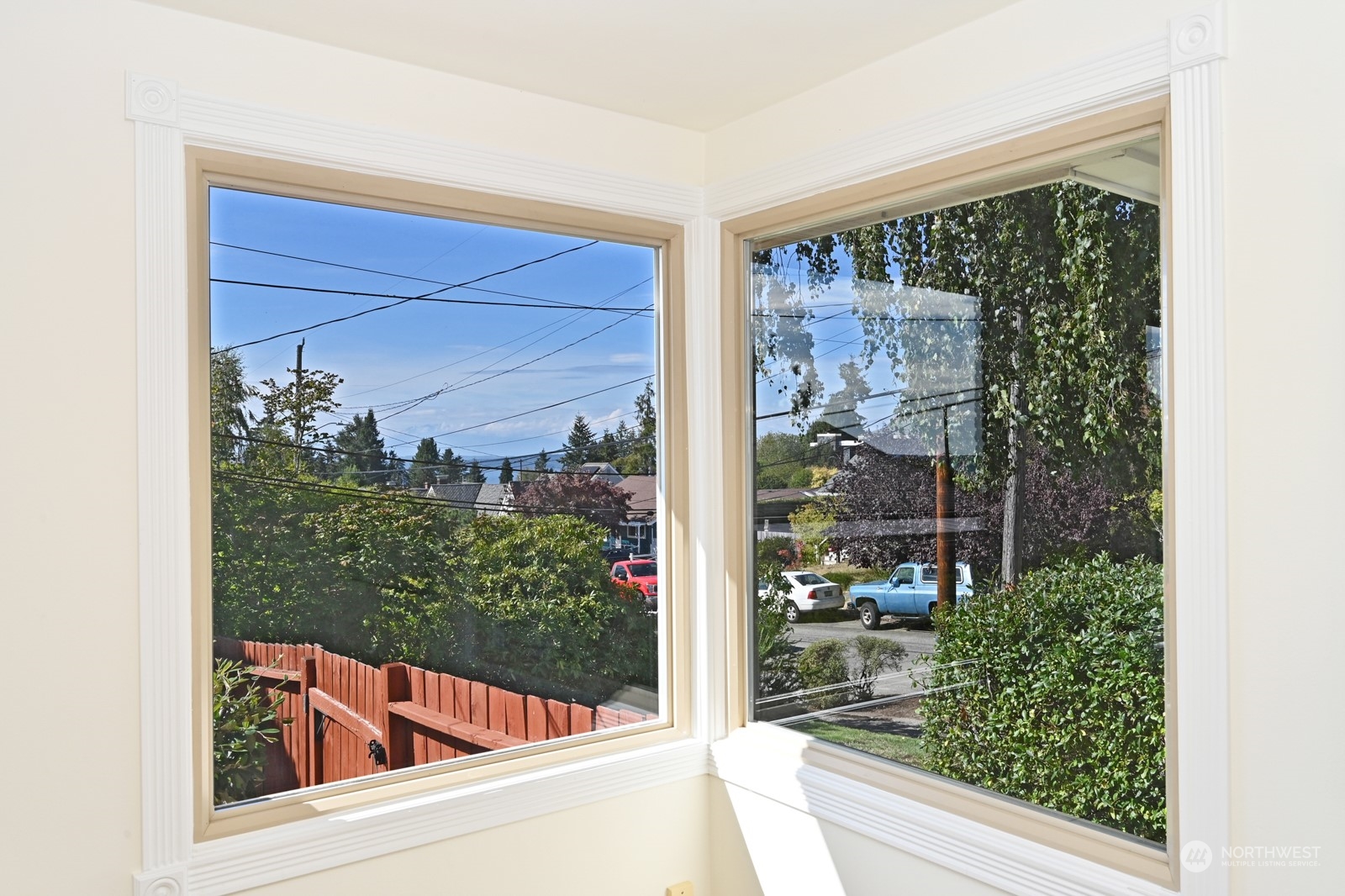 4105 Southwest Monroe Street Seattle, WA 98136 - Photo 12 of 31 a view of a glass door with a yard from a balcony