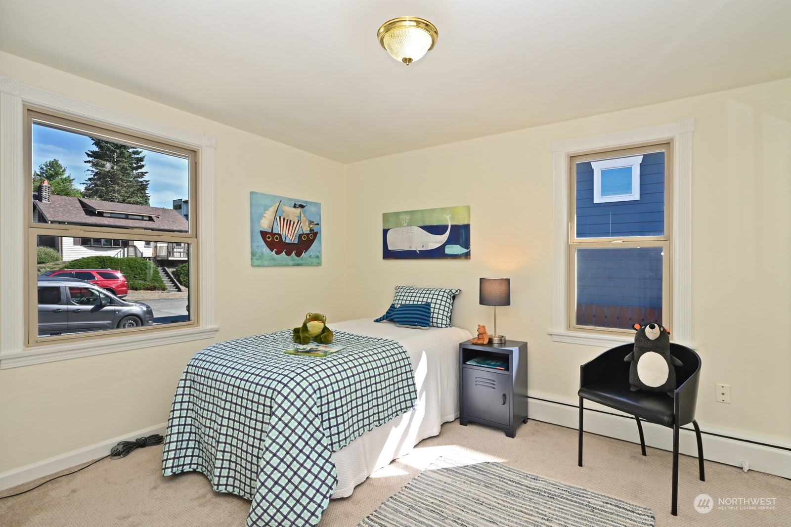 4105 Southwest Monroe Street Seattle, WA 98136 - Photo 18 of 31 a bedroom with a bed and a painting on the wall