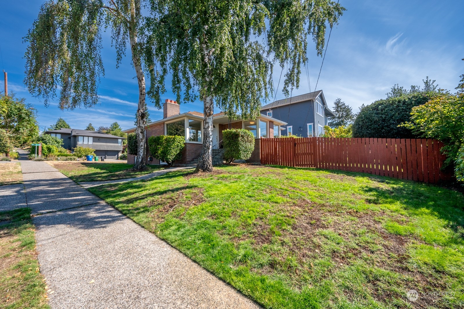 4105 Southwest Monroe Street Seattle, WA 98136 - Photo 2 of 31 a view of a house with a yard