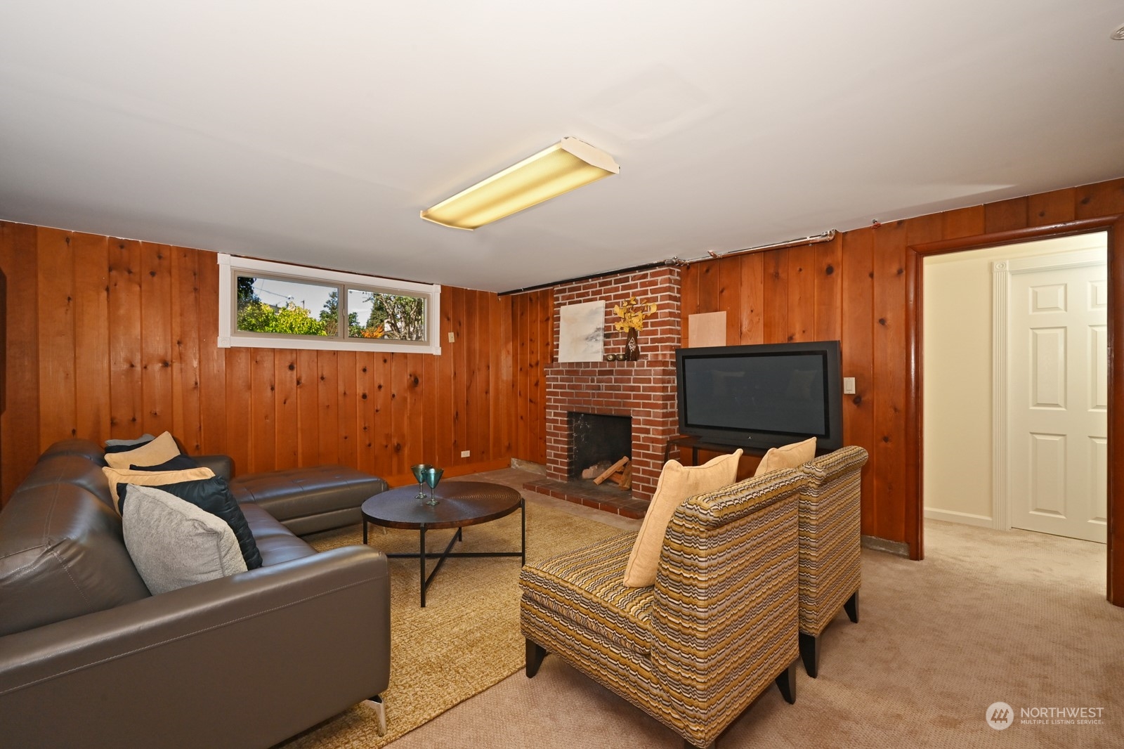 4105 Southwest Monroe Street Seattle, WA 98136 - Photo 21 of 31 a living room with furniture and a flat screen tv