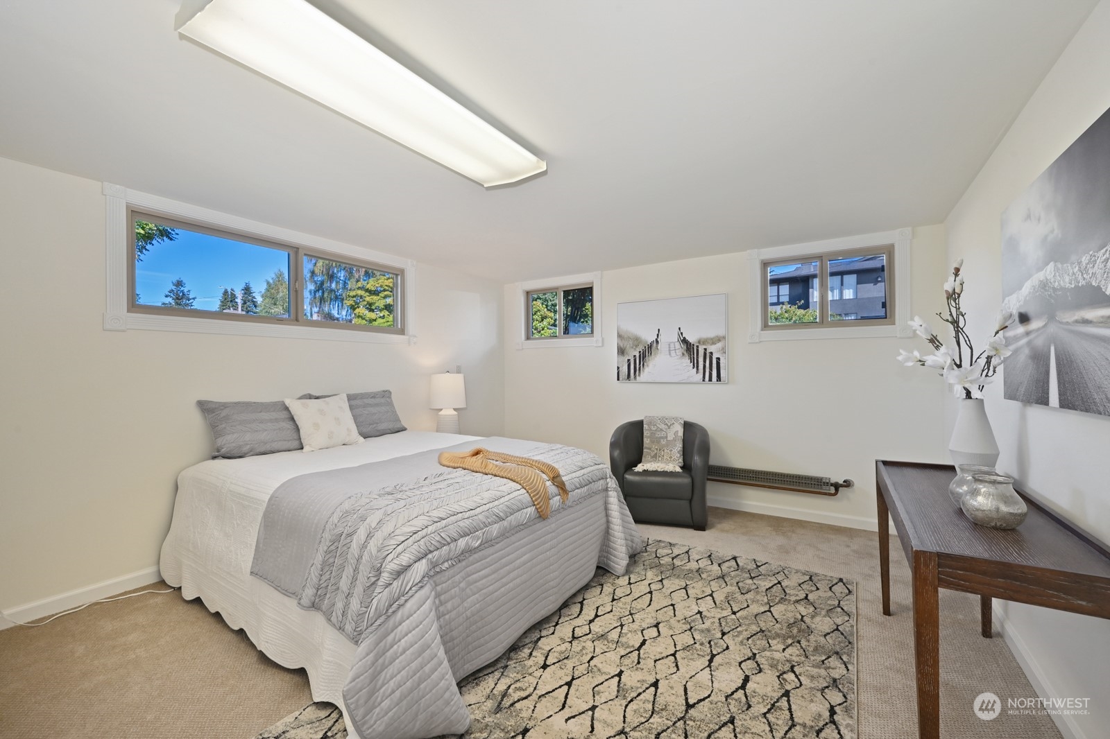 4105 Southwest Monroe Street Seattle, WA 98136 - Photo 23 of 31 a bedroom with a bed and wooden floor