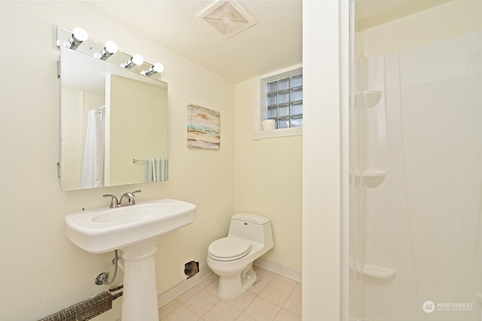 4105 Southwest Monroe Street Seattle, WA 98136 - Photo 24 of 31 a bathroom with a sink a toilet and shower