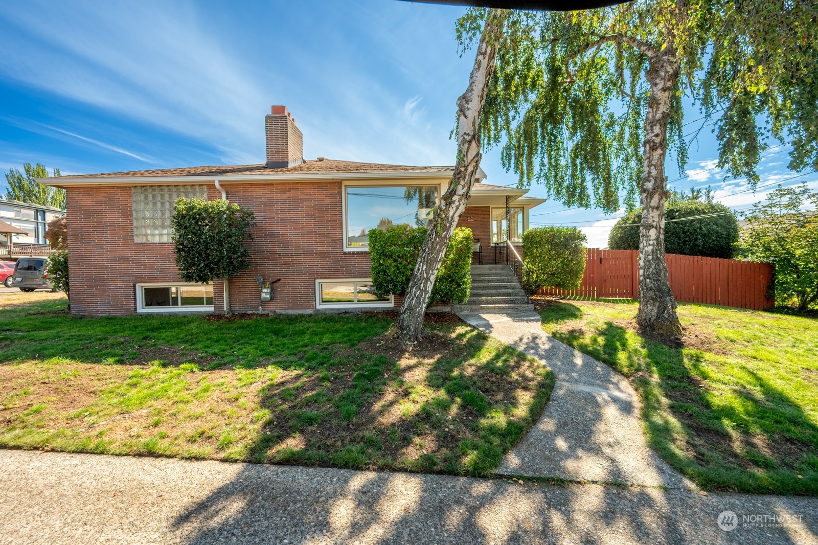 4105 Southwest Monroe Street Seattle, WA 98136 - Photo 4 of 31 front view of a house with a yard