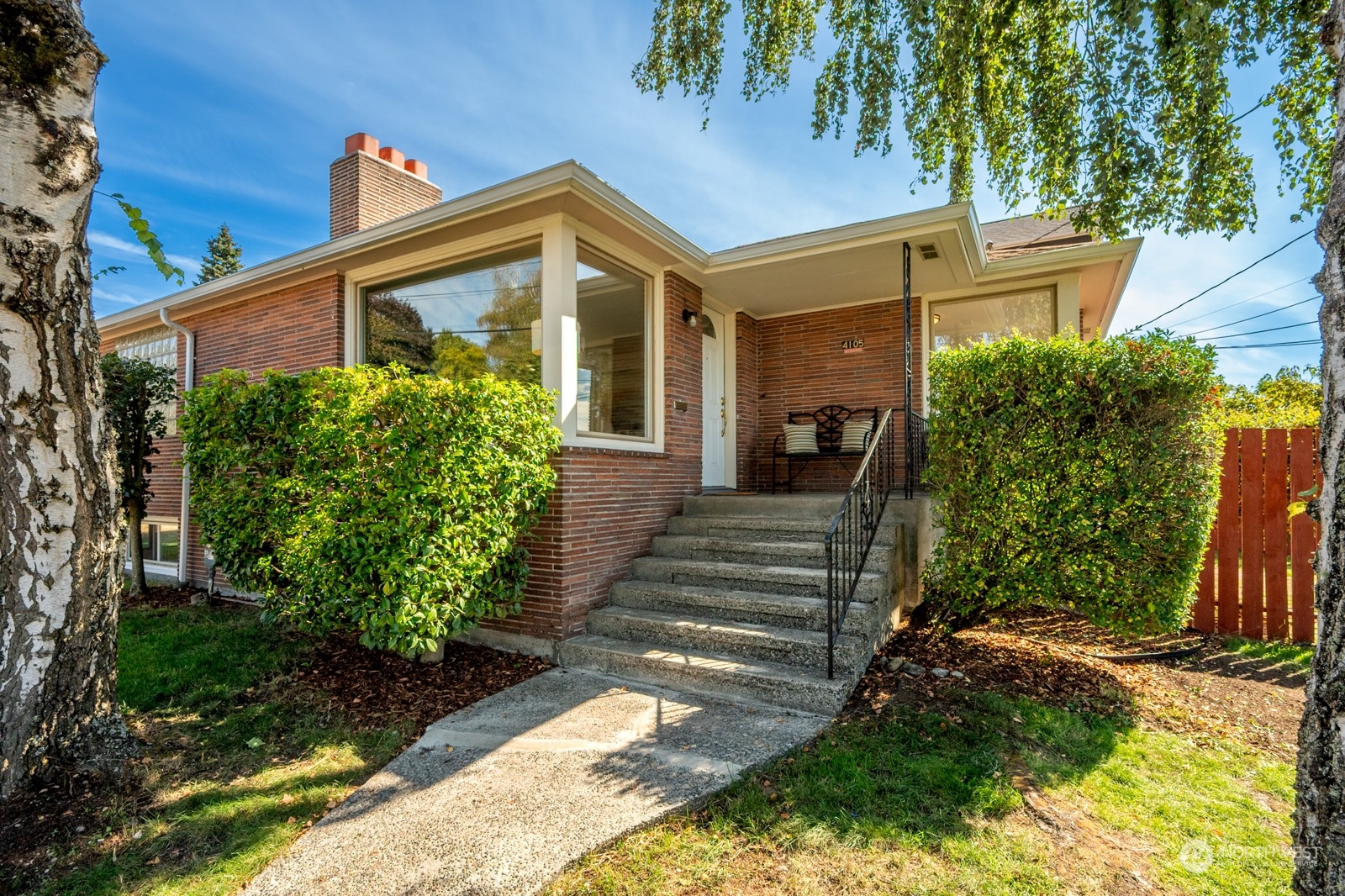 4105 Southwest Monroe Street Seattle, WA 98136 - Photo 5 of 31 a front view of a house with garden