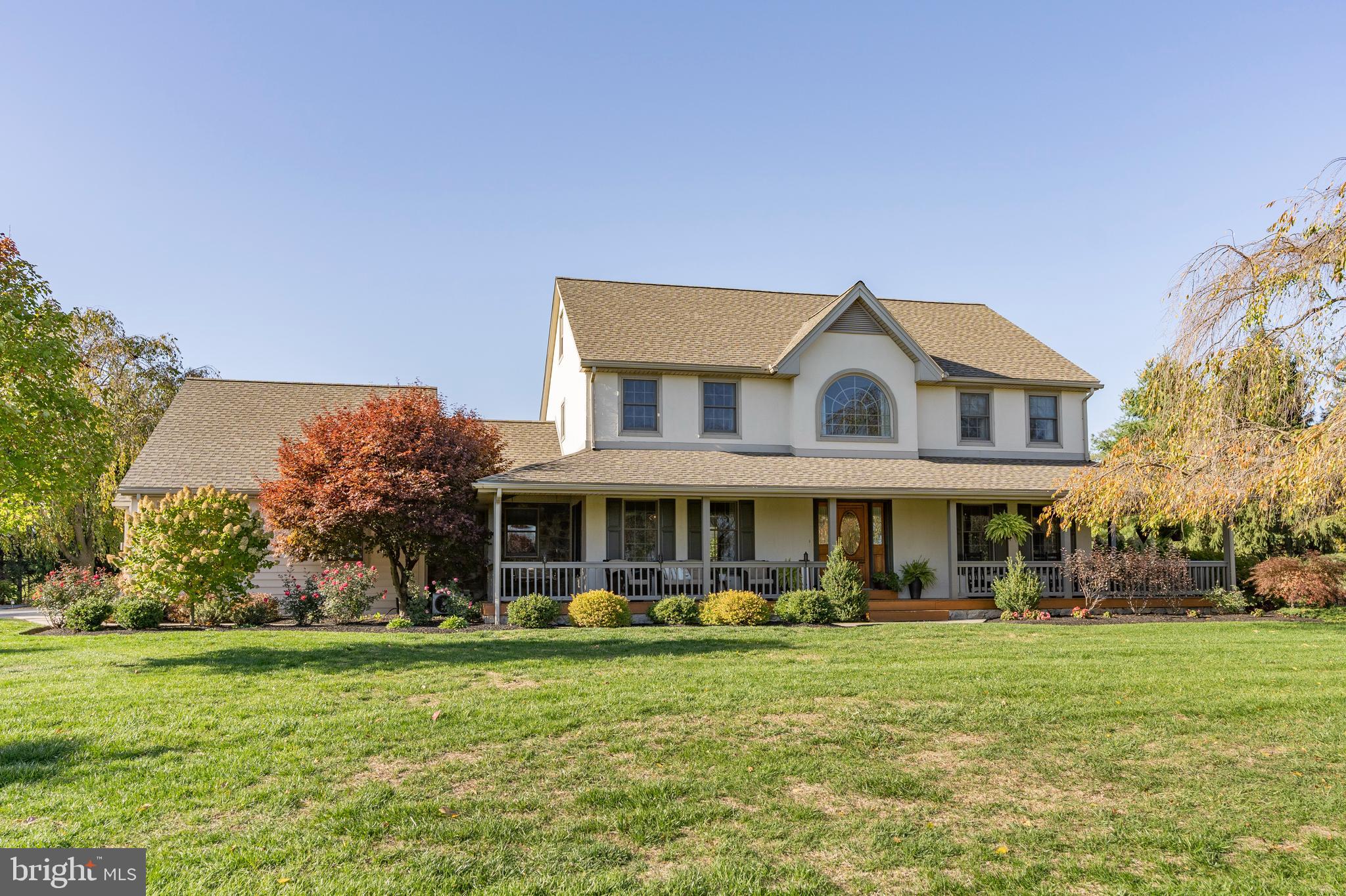 3020 Meadow View Road Manheim, PA 17545 - Photo 1 of 108 a front view of a house with a yard table and chairs