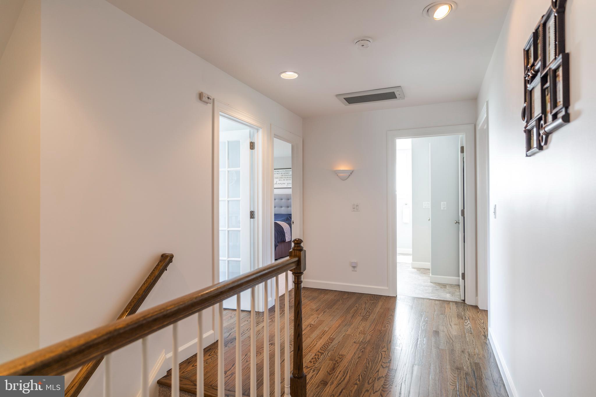 3020 Meadow View Road Manheim, PA 17545 - Photo 31 of 108 a view of a hallway with wooden floor and staircase